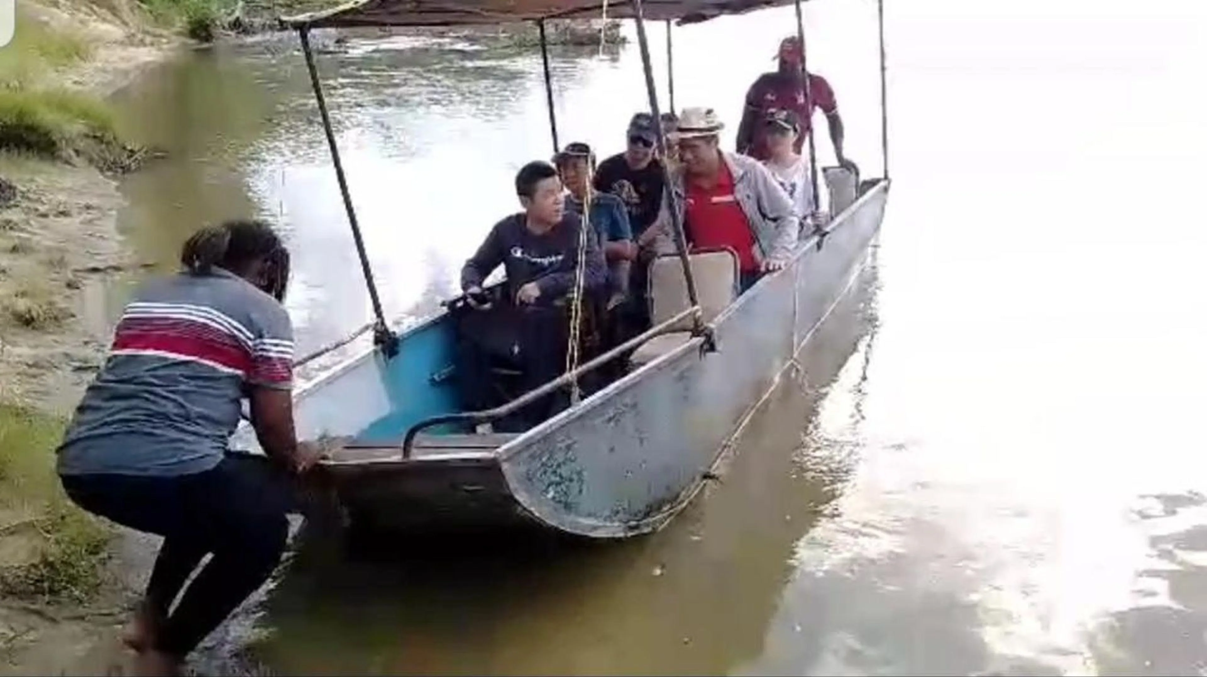 Boat travelling on the river near the camp region
